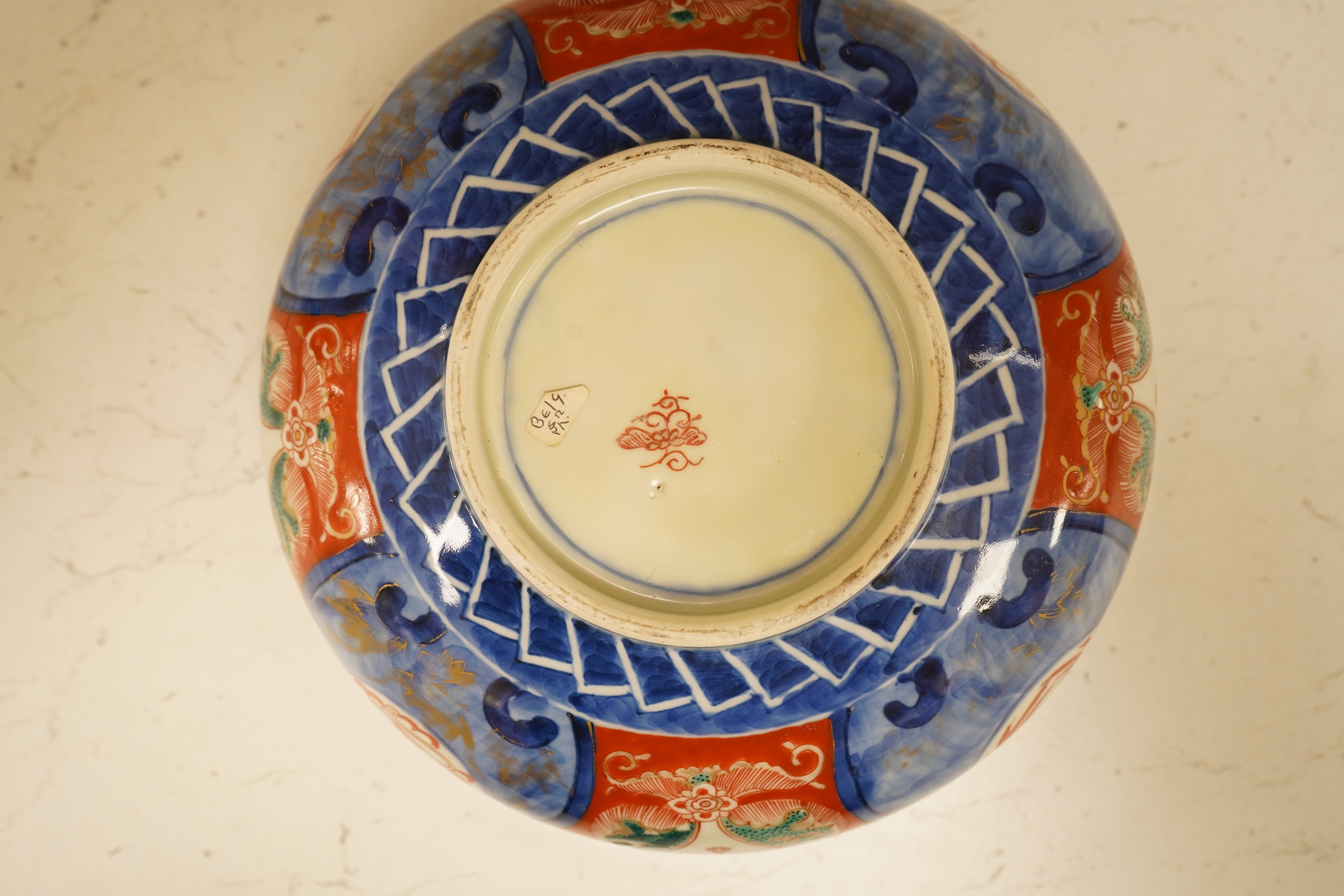 A Japanese Imari bowl and a similar fluted dish, bowl 25cm diameter